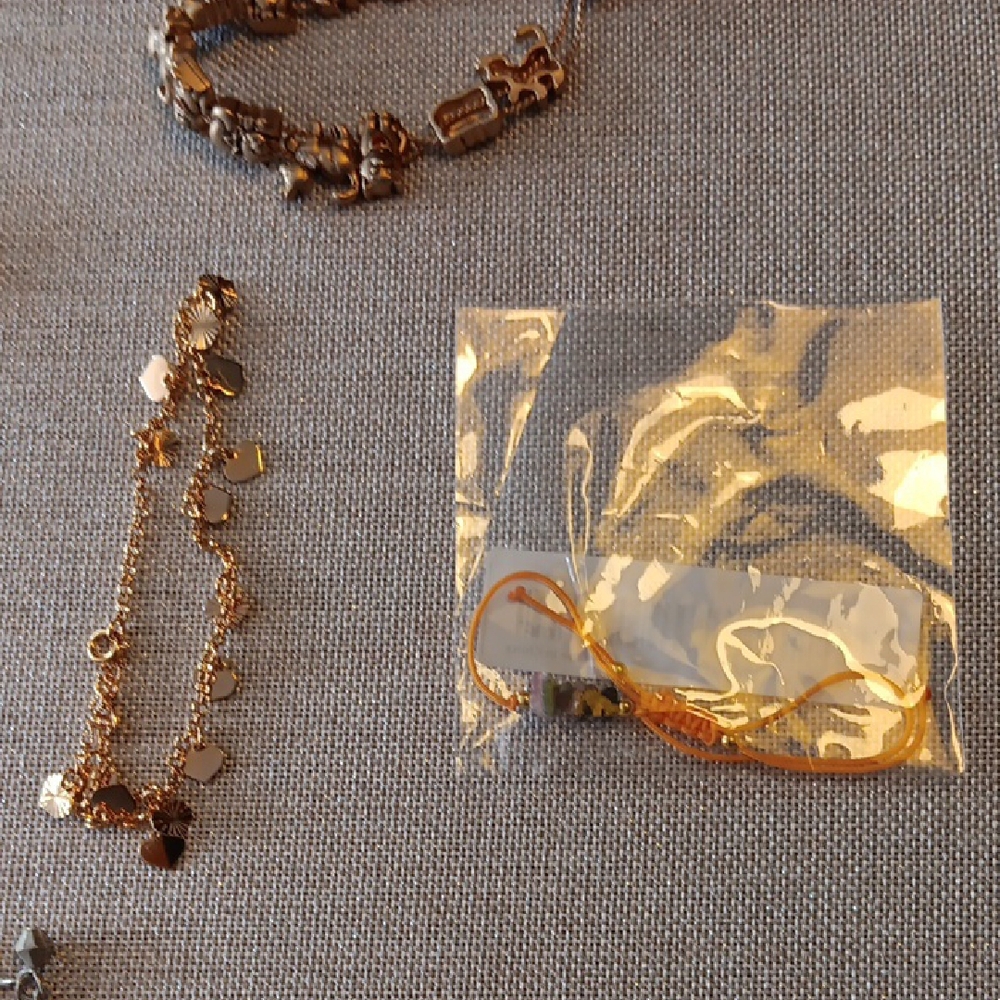 Goldtone and Silvertone Bracelet Collection with Charms and Beads - Picture 3 of 6